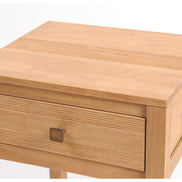 Bedside table with stripe carved pattern