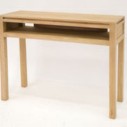 Console with storage rack