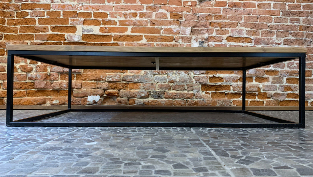 Coffee table in untreated solid reclaimed teak natural wood.