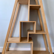 Triangular bookshelf