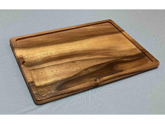 Cutting board with groove