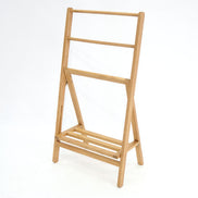 Folding towel hanger