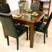 Squared dining table with glass top on an elegant lattice