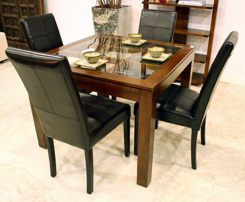 Squared dining table with glass top on an elegant lattice