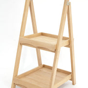 Folding bathroom shelf