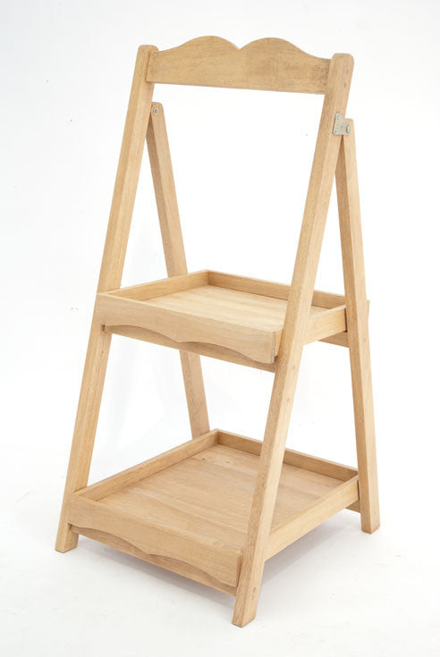 Folding bathroom shelf